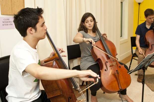 Jay Campbell, Gwen Krosnck, and Fernando Arias rehearsing